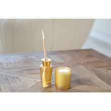 Charger l'image dans la galerie, Bougie dorée parfum vanille 7x7x8cm
